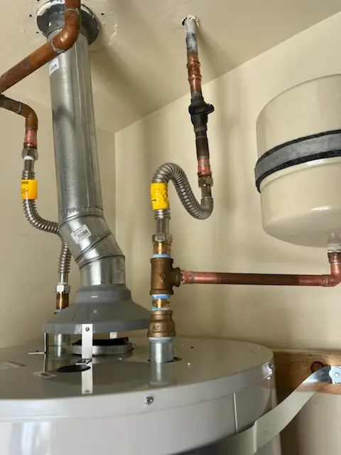 Water heater installation and plumbing repair in Beach